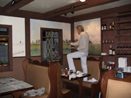 Andre Painting Panels in Swiss Cafe